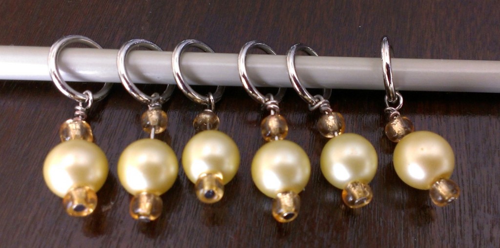 A set of 6 stitch markers. 