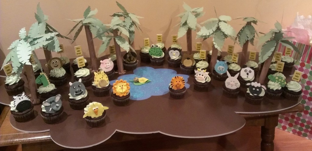 In the jungle baby shower cupcake display