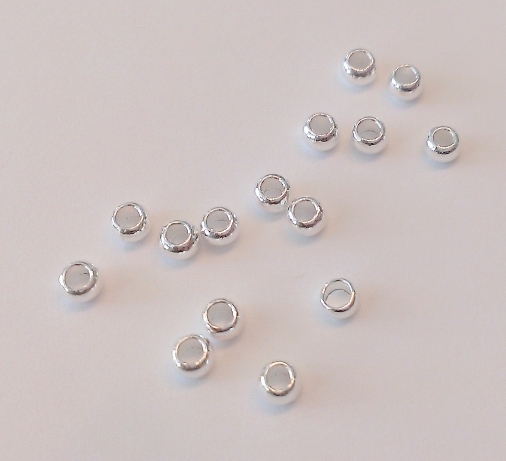 A handful of crimp beads.