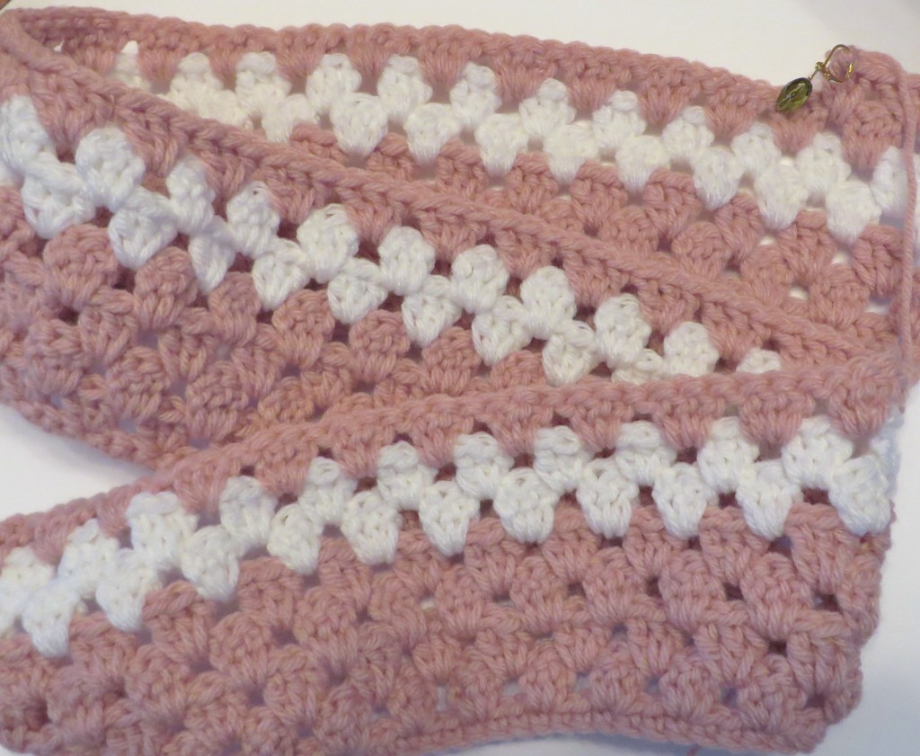 Pink and white crochet baby blanket